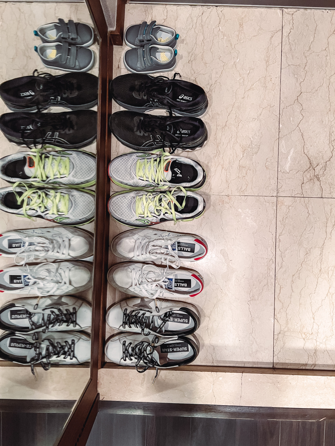 shoes lined up in hotel room